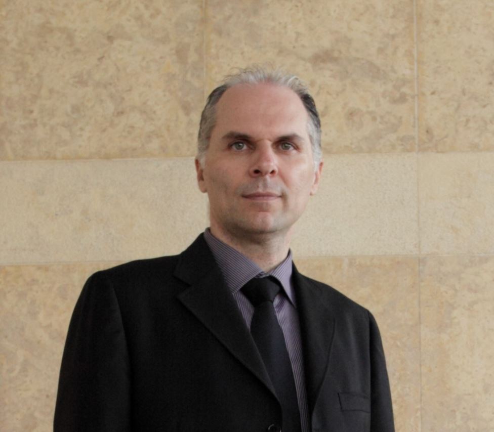 George Mireas facial plastic surgeon portrait Athens Greece