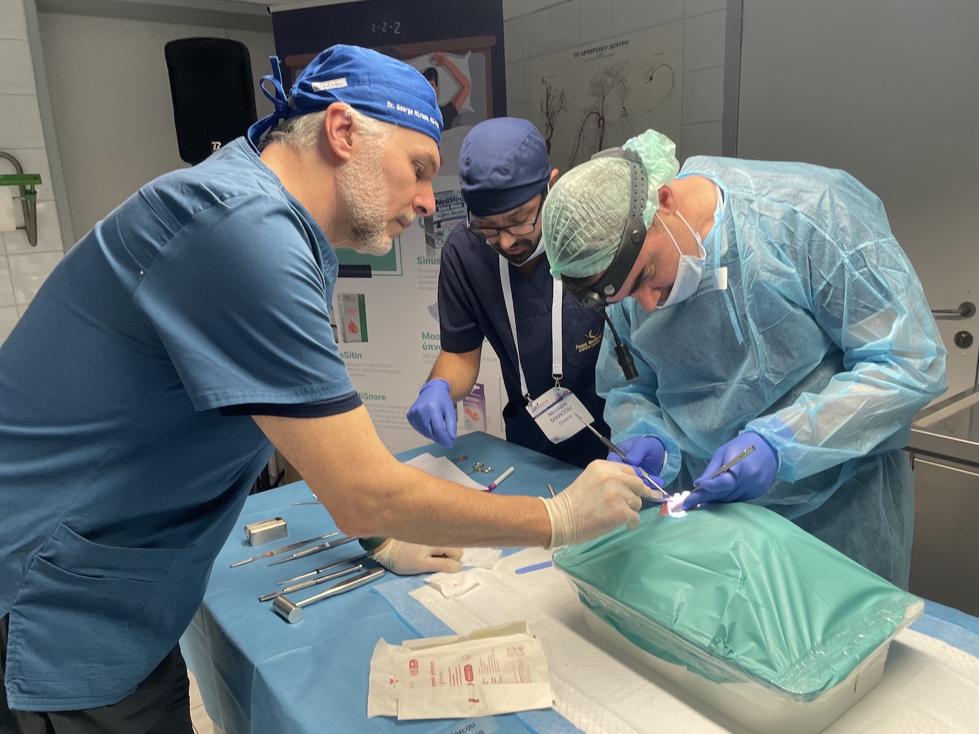Dr George Mireas performing hands-on rhinoplasty cadaver dissection during RhinoDays 2025 in Thessaloniki