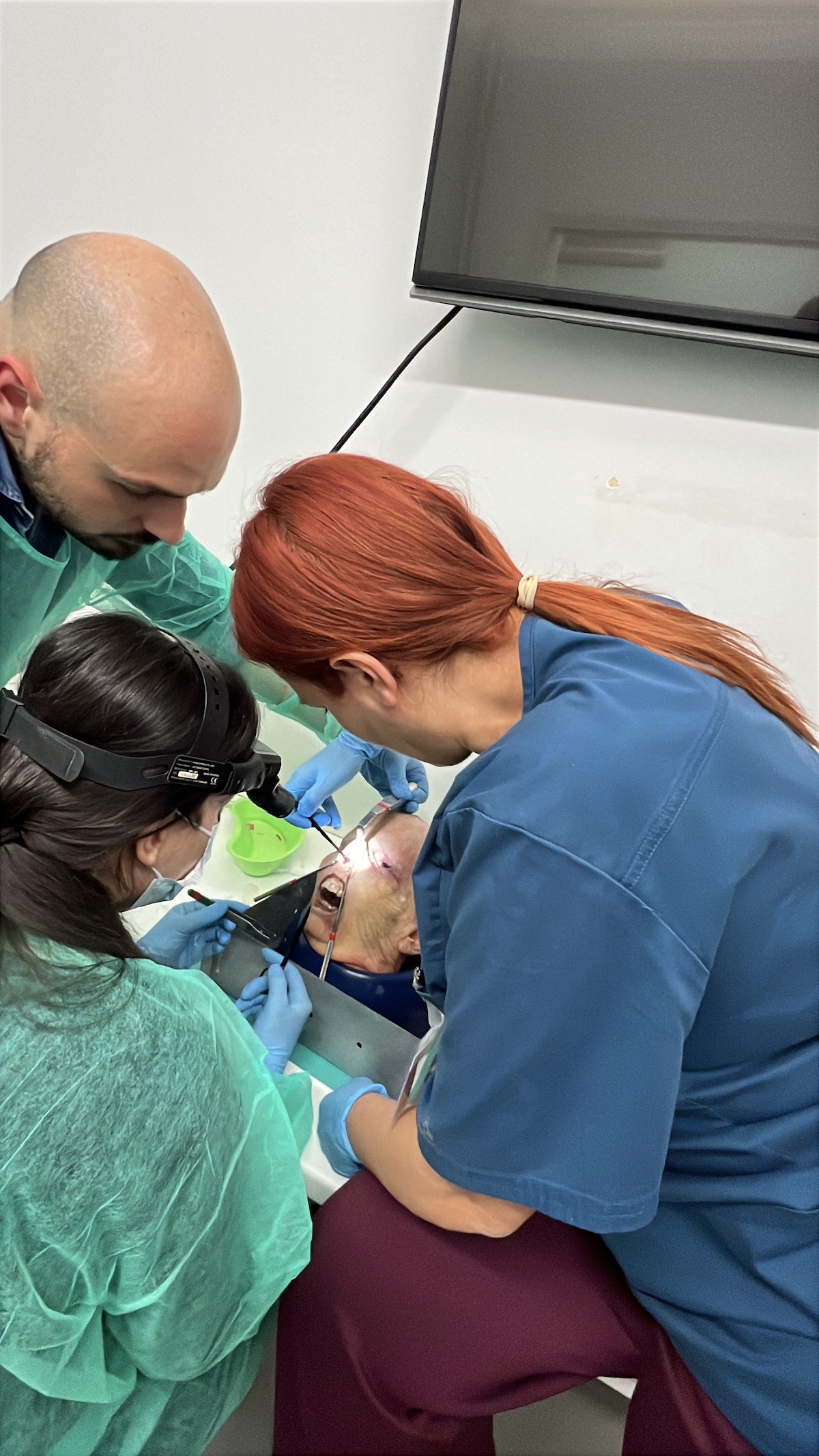Instructor supervision during hands-on cadaver rhinoplasty training at HIFPS Athens 2025