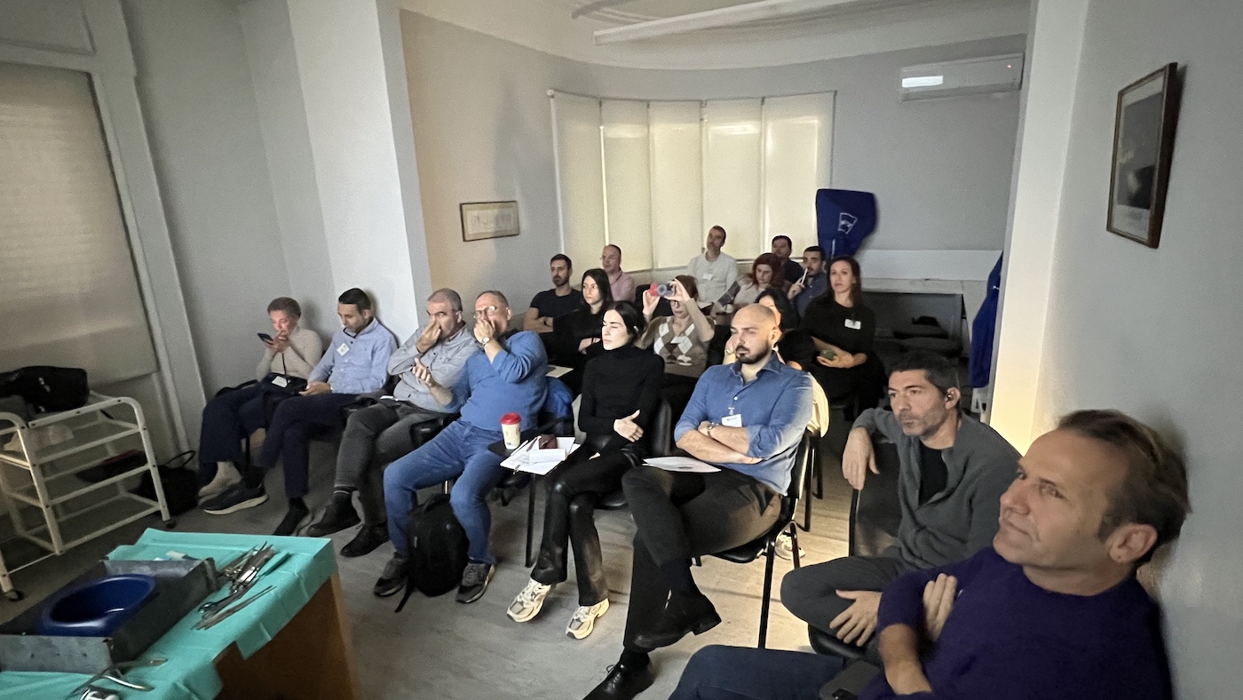 Participants attending a lecture session during HIFPS rhinoplasty cadaver training in Athens