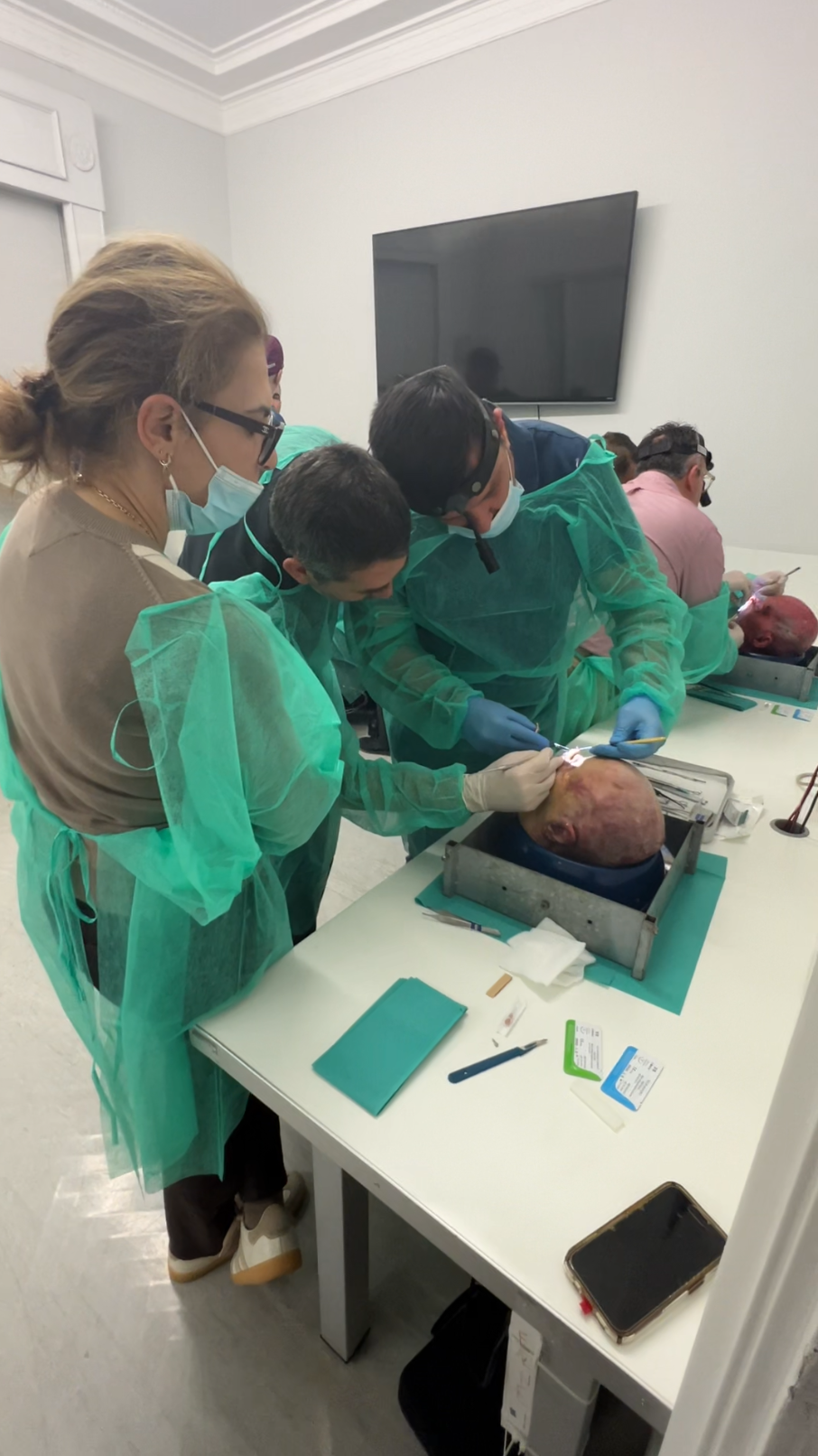 Surgeons observing rhinoplasty dissection during HIFPS cadaver course Athens 2025
